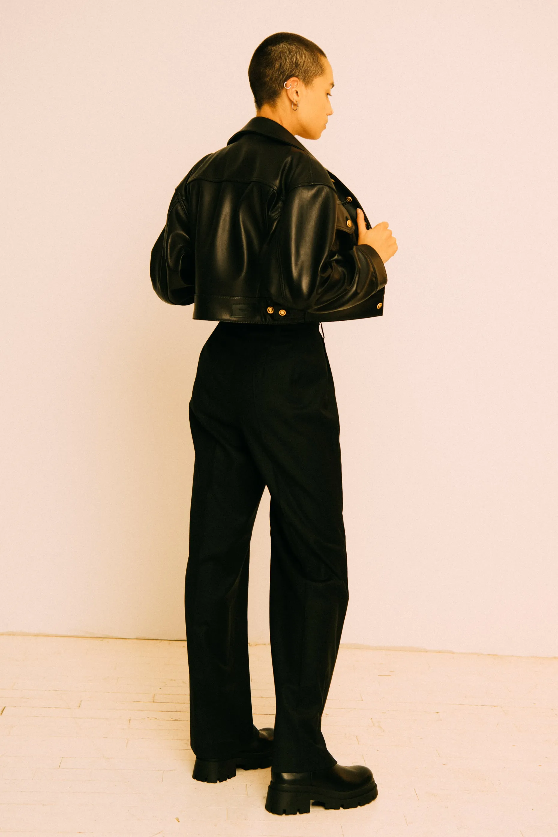 BLACK TRUCKER JACKET WITH GOLD BUTTONS