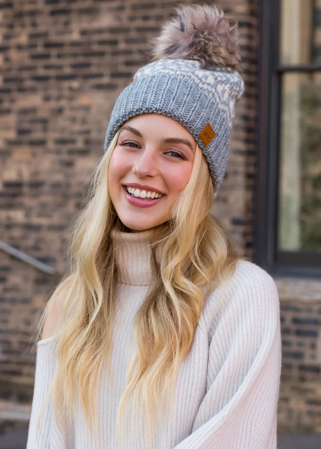 Patterned Knit Hat with Faux Fur Pom